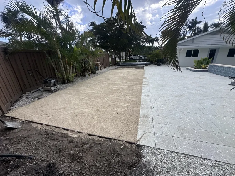 Paver and travertine hardscape by Master360 Services in Venice, FL
