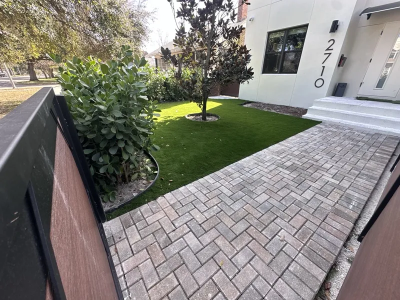 Artificial turf and paver hardscape by Master360 Services in Sarasota, FL