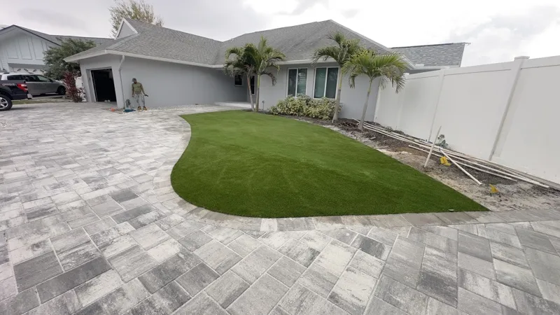 Paver and travertine hardscape by Master360 Services in Largo, FL