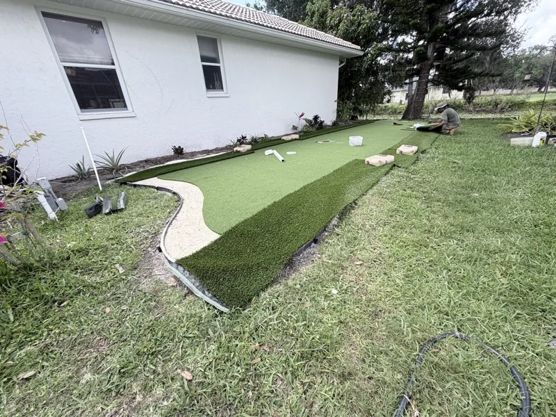 Backyard putting green by Master360 Services in Palmetto, FL